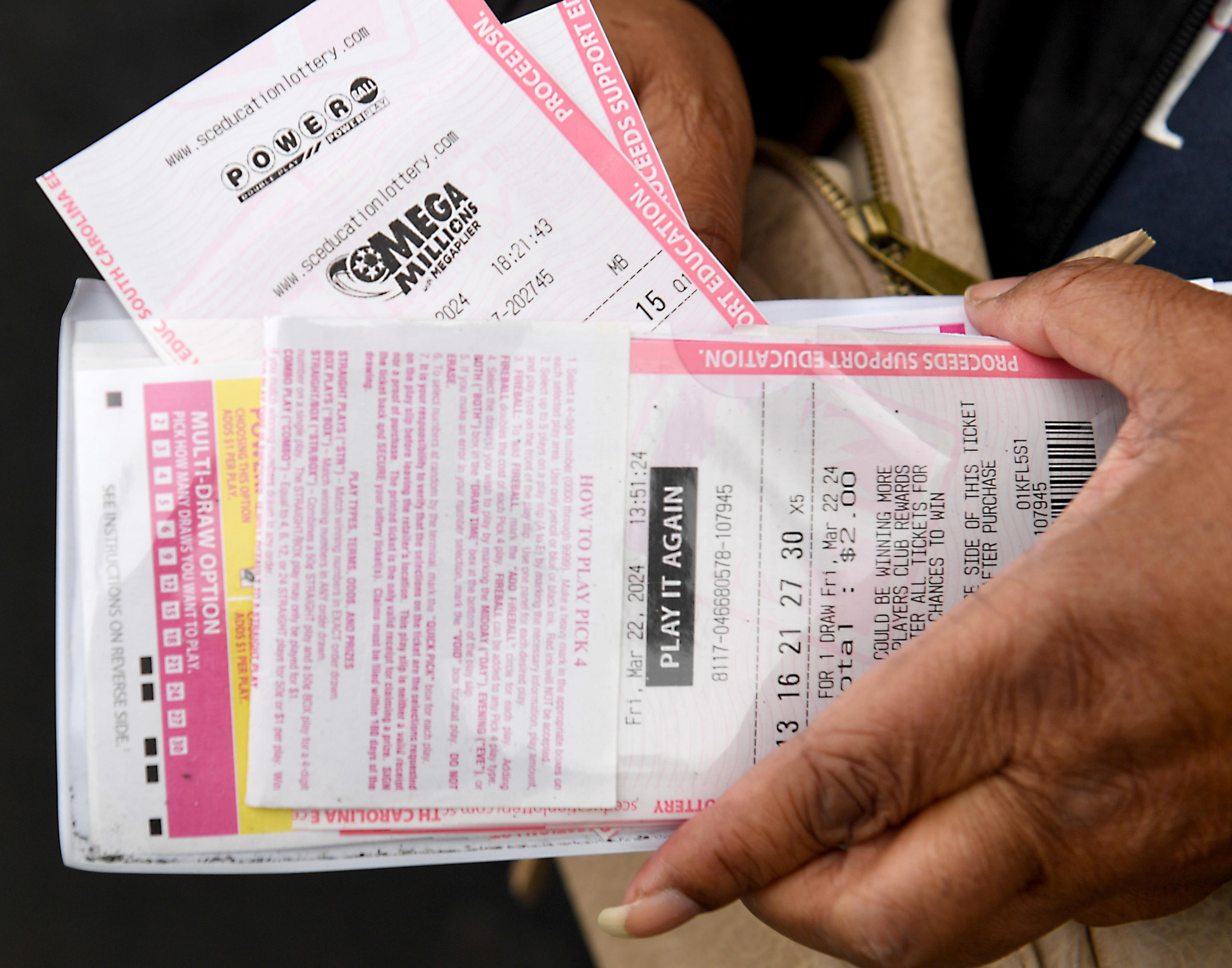 if you win the $935 million powerball, just how much would you have to pay in taxes? a lot.