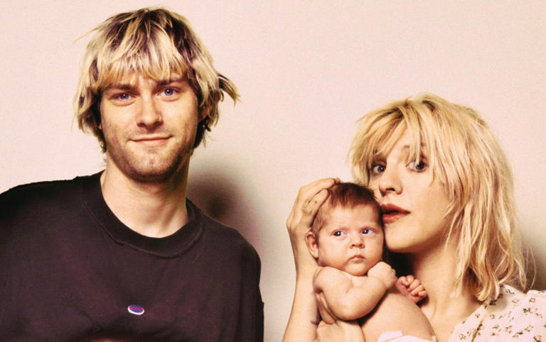 A fragile balance: Kurt Cobain with his wife, Courtney Love, and their daughter, Frances Bean, September 1992 - © 2024 Guzman LLC