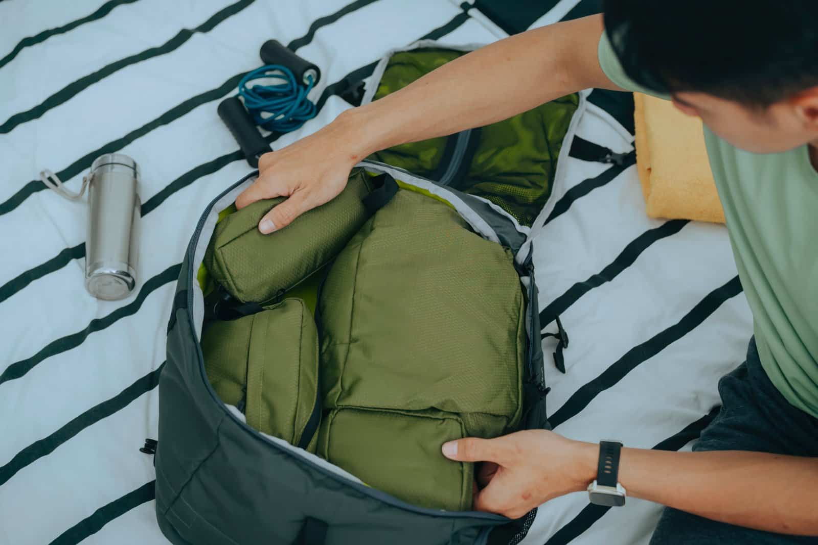 <p class="wp-caption-text">Image Credit: Shutterstock / Febriandi Dimas Wara</p>  <p><span>Packing for a cycling tour is an exercise in balance and foresight, requiring you to be prepared for various scenarios while keeping your load manageable. Essential items include cycling clothing for all weather conditions, a repair kit, spare tubes, and personal items like sunscreen and medications.</span></p> <p><span>Opt for lightweight, versatile gear that can serve multiple purposes, and organize your belongings to make them easily accessible. Remember, every extra pound can make a difference during long climbs and long days in the saddle.</span></p> <p><span>Additionally, consider the environmental impact of your choices, opting for reusable water bottles and eco-friendly products whenever possible. Thoughtful packing will ensure you have everything you need without being weighed down, allowing you to focus on the joy of the ride.</span></p> <p><b>Insider’s Tip: </b><span>Use packing cubes or bags to organize your gear by category (e.g., clothes, tools, personal care), making it easier to find what you need without unpacking everything.</span></p>
