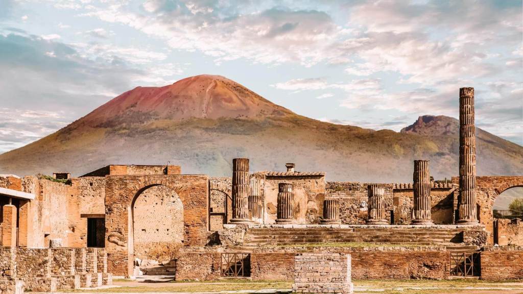 <p>If you’re looking for a day trip from Naples, a good one would be Mount Vesuvius; they are just 9 km apart. It is famous for erupting and burying the Roman cities of Pompeii and Herculaneum in 79 AD.  Although Mount Vesuvius erupted several times during the 18th and 19th centuries, it has not spewed out since March 1944. </p><p>The beauty of this volcano is that it is easy to climb. Within 30 to 40 minutes, you can reach this mountain’s summit since the path to follow is well-marked and maintained. The best time to hike Mount Vesuvius is in the fall or spring, as the weather is mostly mild and the crowds are relatively small.</p><p class="has-text-align-center has-medium-font-size">Read also: <a href="https://worldwildschooling.com/best-historical-places-in-the-world/">Best Historical Destinations Across the World</a></p>