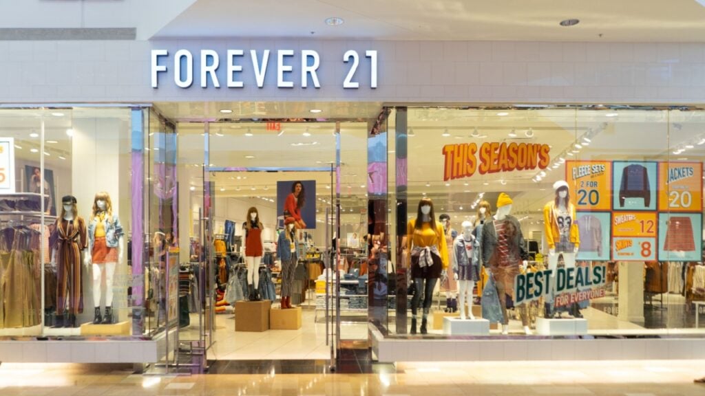 <p>Forever 21 is an American fashion retailer that sells very affordable clothing for women, men, and children. The company’s Social Responsibility page on their website reads: “Forever 21 also shares the goal of eliminating child labor and forced labor.” But in 2016, the U.S. Labor Department investigators made allegations that workers were getting paid around $4.50 an hour to put labels and other finishing touches on blouses for one of the retailer’s suppliers. </p><p>According to <a href="https://www.forbes.com/sites/walterloeb/2023/10/30/forever-21-signs-deal-with-shein-group/#:~:text=Authentic%20Brands%20Group%20(ABG)%20has,in%20multiple%20billions%20of%20sales."><em>Forbes</em></a>, Authentic Brands Group (ABG) has signed a deal with Shein Group to cross-sell merchandise in Forever 21 stores.</p>