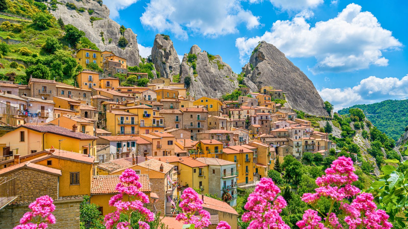 <p><span>Few Italian towns have a location as unique as Castelmezzano. Picturesque is an understatement – it’s like something from a fairytale.</span></p><p><span>You’ll find it in the Dolomiti Lucane mountain range in southern Italy’s Basilicata region. Expect traditional terracotta rooves sandwiched between mountain peaks, with panoramic views over the area. History, adventure, and outdoor opportunities await.</span></p>
