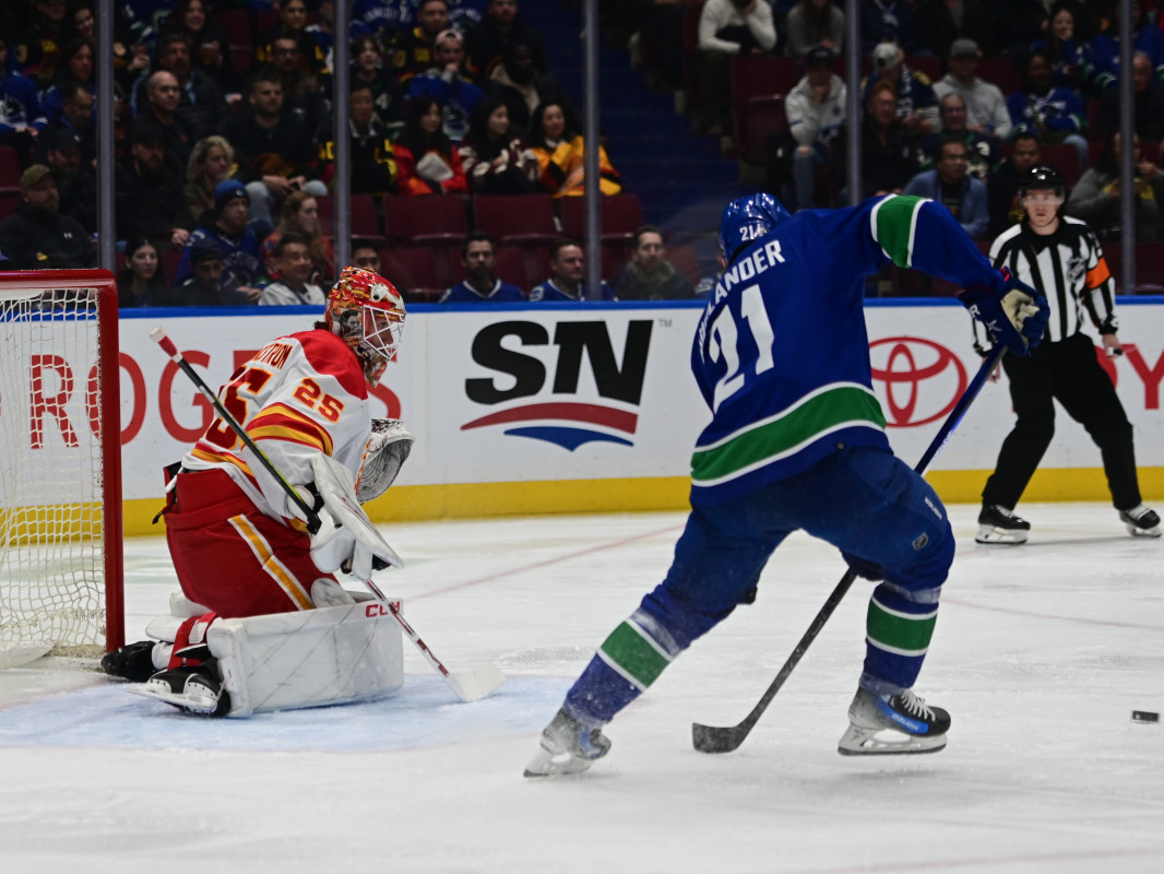 revenge game: lindholm and canucks get best of kuzmenko and calgary flames