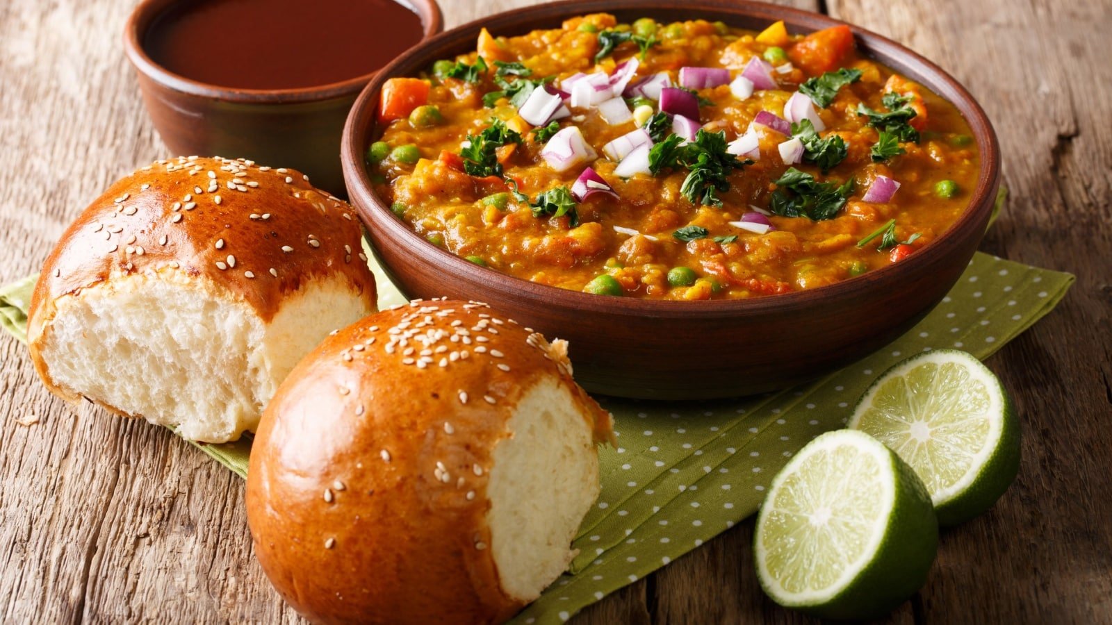 <p><span>Next stop: India. Pav Bhaji is a popular street food that originated in Mumbai and has now spread to every corner of the country. This spicy vegetable curry served with buttered buns is a burst of flavors that will tantalize your taste buds and leave you wanting more.</span></p><p><span>Pav bhaji is not just a food; it’s an emotion that brings comfort with every mouthful. The hearty mixture of mashed vegetables cooked with aromatic spices and served with warm, butter-laden buns is truly an experience beyond mere sustenance. It’s a bright, bustling symphony of flavors that mirrors the vibrant spirit of Indian streets, making it an unmissable part of any culinary adventure in India.</span></p>