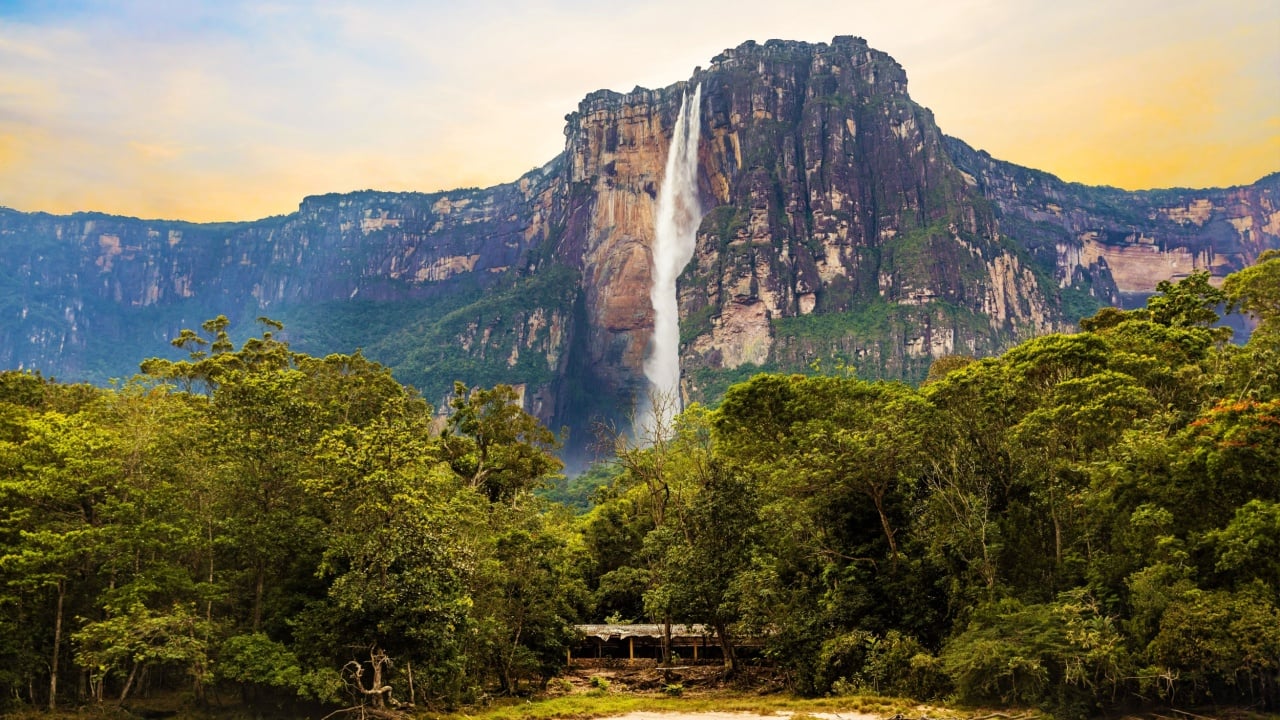 <p>Angel Falls has the world’s largest uninterrupted fall at 2,648 feet and a total drop of 3,212 feet—15 times higher than Niagara Falls. It’s certainly not an easy waterfall to reach, as you’ll likely need a visa to enter Venezuela. Then, it’s likely a journey by plane to the town of Canaima and a day-long boat ride to the falls. But the experience is well worth it.</p>