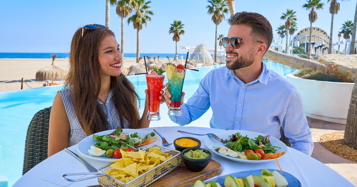 <p> Cocktails are a great way to relax while on a cruise, trip to the beach, or other vacation. But those drinks are going to come with a big price markup. </p> <p> Try to limit the number of fancy cocktails you consume while on vacation. Or, check with your resort or cruise line to see if they offer a drink plan that can help you cut costs. </p>