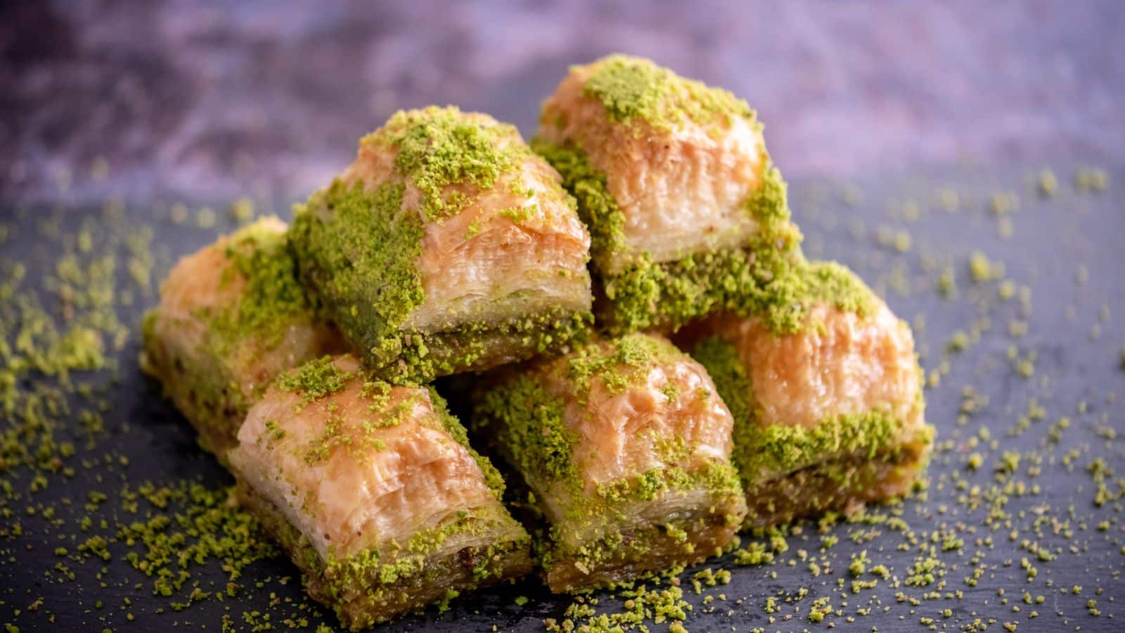 <p><span>A popular Middle Eastern dessert, baklava consists of layers of flaky pastry filled with nuts and soaked in honey or syrup. It’s a sweet and decadent treat that can be found at street vendors throughout Turkey.</span></p><p><span>Baklava is more than a dessert; it’s a testament to Turkey’s rich history and culinary expertise. Each bite of this sweet, sticky pastry tells a story of tradition and craftsmanship passed down through generations. When you savor a piece of baklava, you’re partaking in a timeless Turkish delight that embodies the spirit of the region’s hospitality and love for good food. </span></p>
