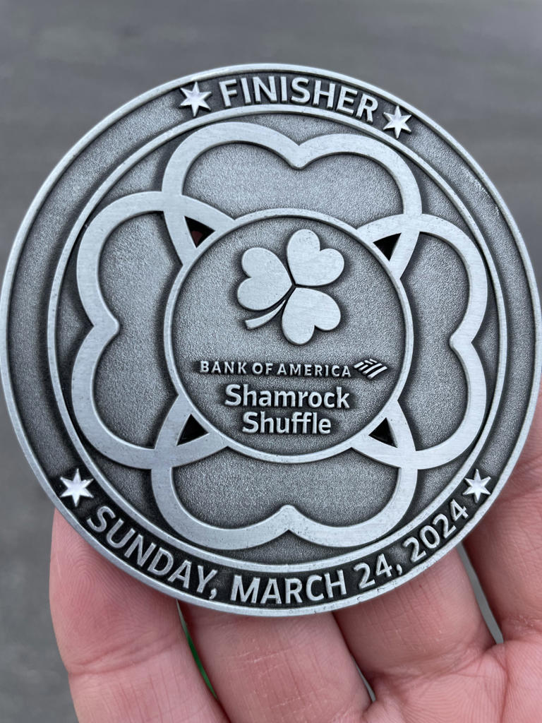 See the 2024 Bank of America Shamrock Shuffle finisher medal