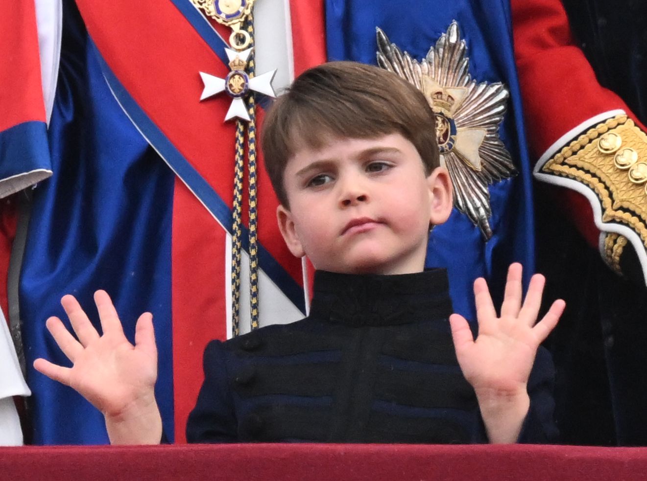 <p><span>Prince Louis was up to his usual antics while on the balcony of Buckingham Palace in London following the </span><a href="https://www.wonderwall.com/celebrity/the-coronation-of-king-charles-iii-and-queen-camilla-the-best-pictures-of-all-the-royals-at-this-historic-event-735015.gallery">coronation</a><span> of King Charles III on May 6, 2023.</span></p><p>MORE: <a href="https://www.wonderwall.com/celebrity/royals-line-british-throne-order-succession-3012158.gallery?photoId=648489">See the first 30 British royals in the line of success behind King Charles III</a></p>