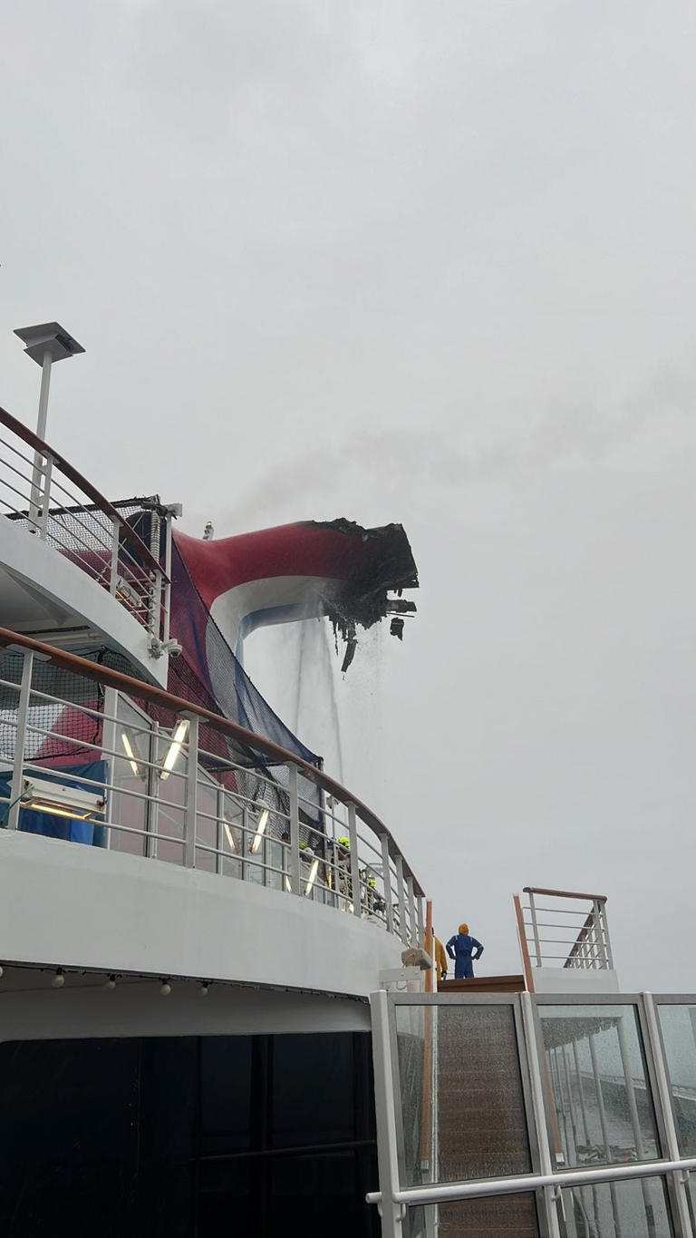 This photo shows the damage to the exhaust funnel on the Carnival Freedom cruise ship caused by a fire while at sea on Saturday.