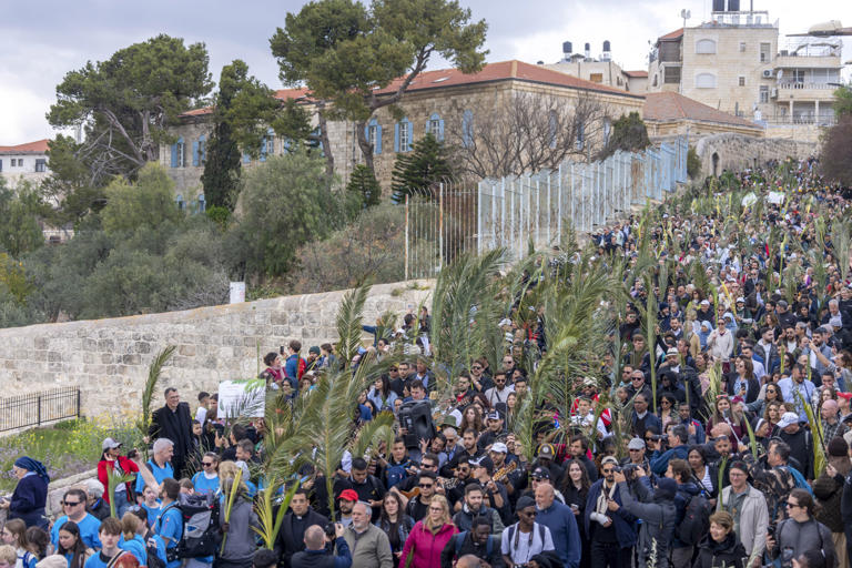 Thousands Attend Palm Sunday Celebrations in Jerusalem Against Backdrop