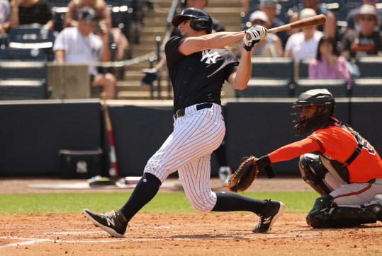 Mar 11, 2024; Tampa, Florida, USA; New York Yankees third baseman DJ LeMahieu (26) singles during the second inning against the Baltimore Orioles at George M. Steinbrenner Field. Mandatory Credit: Kim Klement Neitzel-USA TODAY Sports