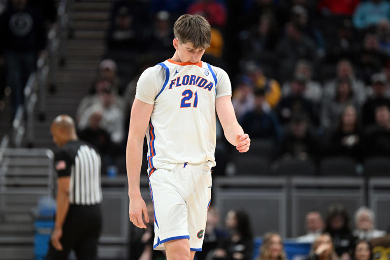 Mar 22, 2024; Indianapolis, IN, USA; Florida Gators forward Alex Condon (21) reacts in the second half against the Colorado Buffaloes in the first round of the 2024 NCAA Tournament at Gainbridge FieldHouse. Mandatory Credit: Robert Goddin-USA TODAY Sports