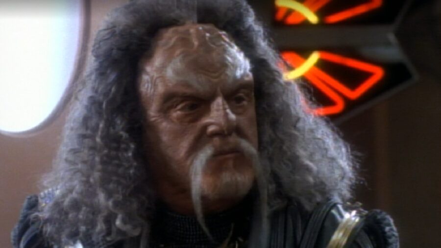 <p>In “Blood Oath,” we learn that The Albino is a criminal whose powerful organization was overthrown by three famous Klingons from The Original Series: Kor, Koloth, and Kang. These warriors weren’t able to capture The Albino himself, so the criminal vows vengeance on them. Years later, he delivers on this grim promise by using a genetic virus to ensure that the firstborn sons of his enemies all die.</p>