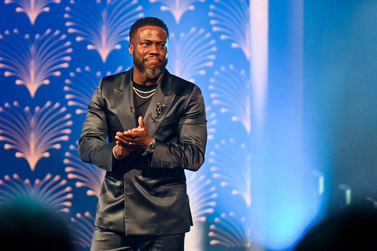 Kevin Hart acknowledges applause on stage during the 25th Annual Mark Twain Prize for American humor at the John F. Kennedy Center for the Performing Arts in Washington, D.C. on March 24, 2024.