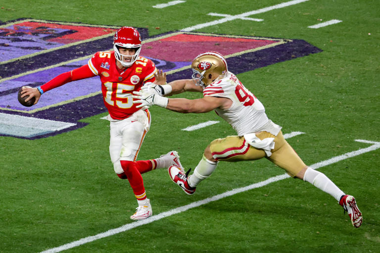LAS VEGAS, NEVADA - FEBRUARY 11: Quarterback Patrick Mahomes #15 of the Kansas City Chiefs looks to throw under pressure from defensive end Nick Bosa #97 of the San Francisco 49ers in the fourth quarter of Super Bowl LVIII at Allegiant Stadium on February 11, 2024 in Las Vegas, Nevada.   The NFL has now voted to ban the hip-drop tackle from use in the 2024 season.