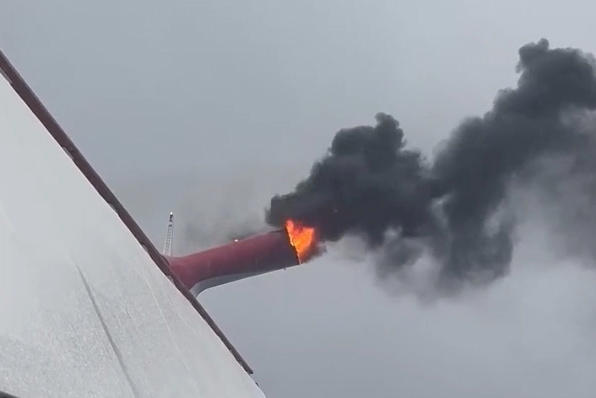 The ship’s exhaust funnel caught fire for two hours before it was extinguished (Picture: Heath Barnes/ LOCAL NEWS X/SWNS)