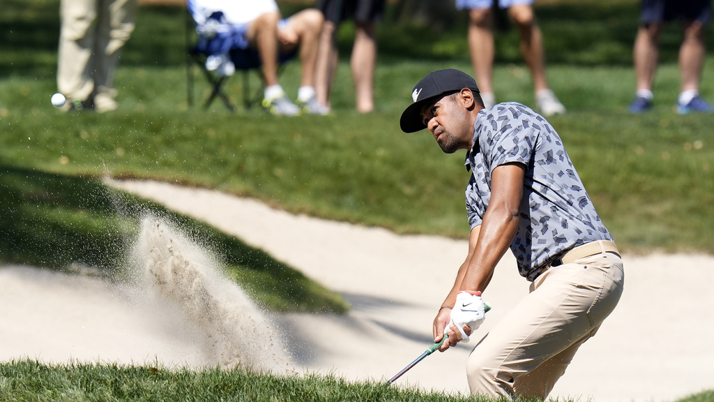 <p>Tony Finau blasts from the sand trap on the fifth hole during the first round of the Valspar Championship golf tournament Thursday, March 21, 2024, at Innisbrook in Palm Harbor, Fla. </p>