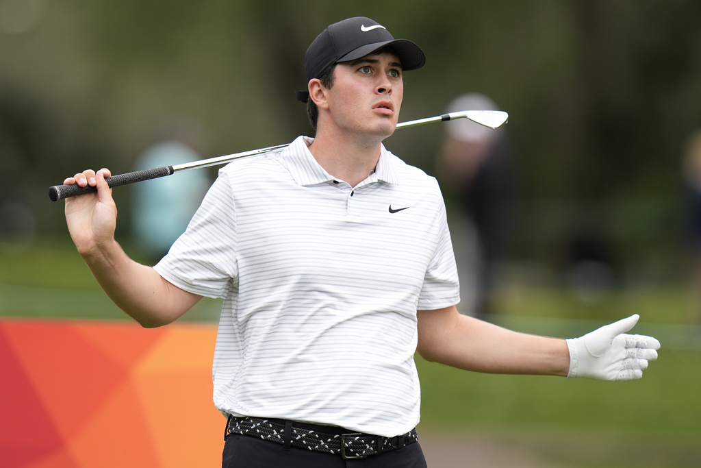 <p>Davis Thompson reacts to his shot on the eighth hole during the second round of the Valspar Championship golf tournament Friday, March 22, 2024, at Innisbrook in Palm Harbor, Fla. </p>
