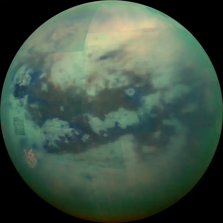 The darker areas across Titan's equatorial regions represent its dunes, as taken by the Cassini rover.