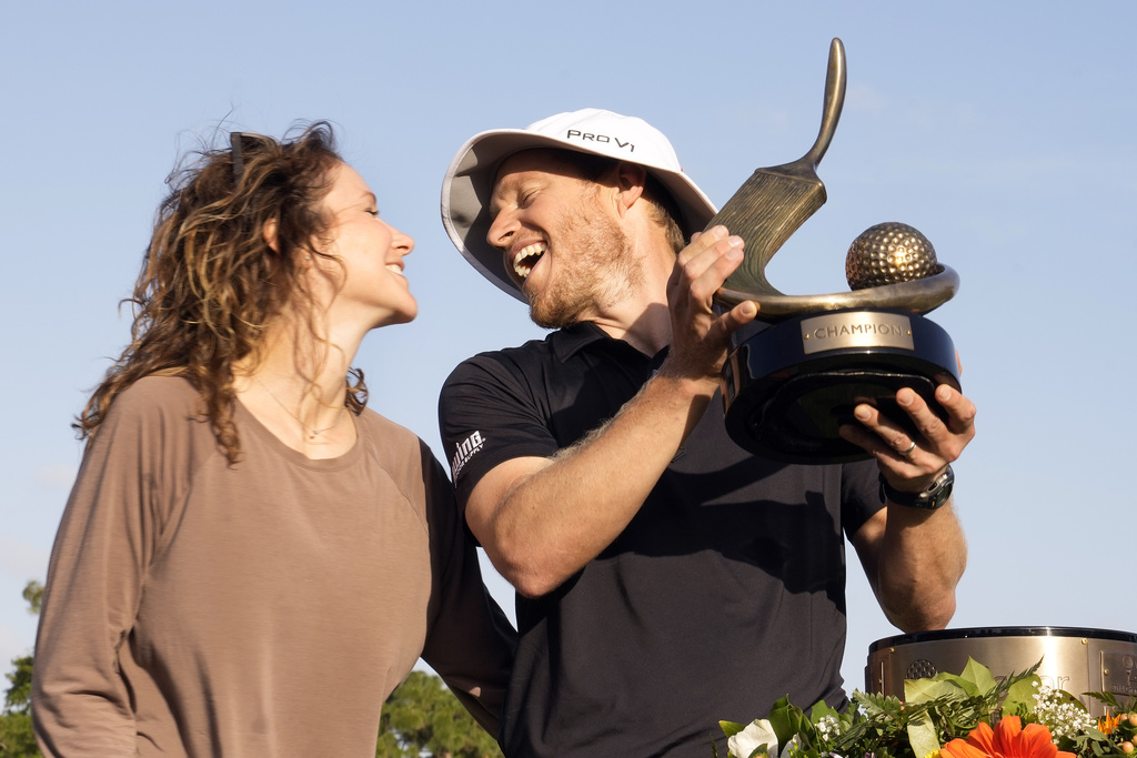 <p>Peter Malnati celebrates with his wife Alicia after winning the Valspar Championship golf tournament Sunday, March 24, 2024, at Innisbrook in Palm Harbor, Fla. </p>