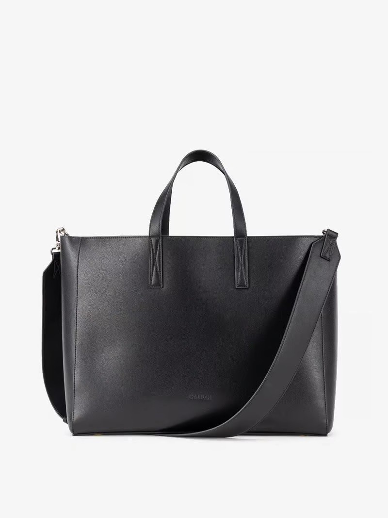 <h3><a href="https://fave.co/4a8ceym" rel="noopener noreferrer">CALPAK Haven Laptop Tote Bag</a> </h3><p>This laptop tote bag is HIGH on my spring wish list because it's like it was designed for specifically for those of us who carry our laptops around. If you work from home and need to get out of the house, you can place your laptop in it and head to your local book store. What I especially love is that the <strong><a href="https://www.brit.co/laptop-wallpapers/">laptop</a></strong> sleeve is <em>removable </em>and the shoulder strap is <em>adjustable</em>. It doesn't get any better than this!</p><a href="https://fave.co/4a8ceym">Shop Now</a>