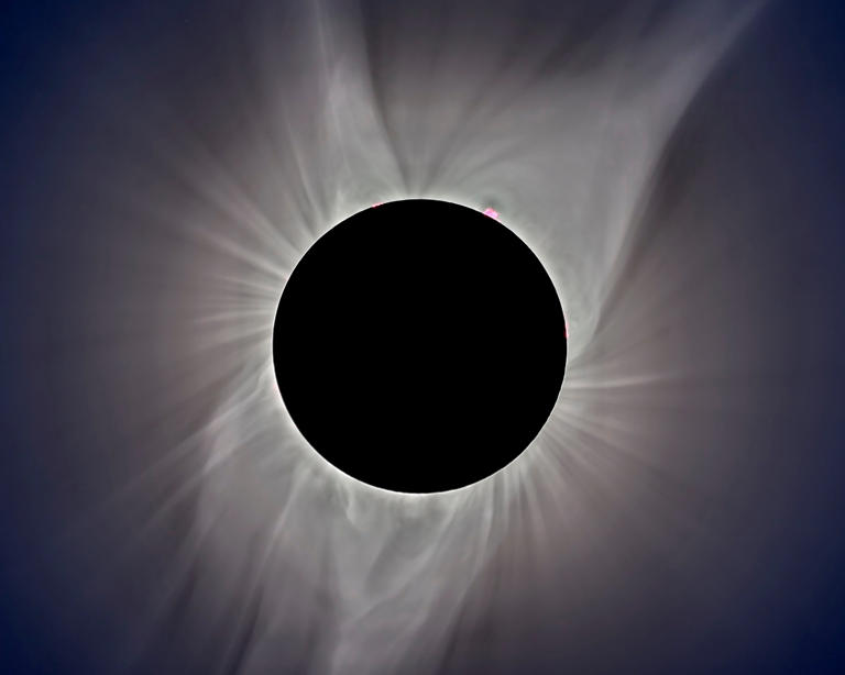 Delicate streamers in the sun's corona surround the totally eclipsed sun during the Aug. 21, 2017, total solar eclipse. Observers along a narrow track from Mexico to Maine should have a similar view on April 8, 2024.