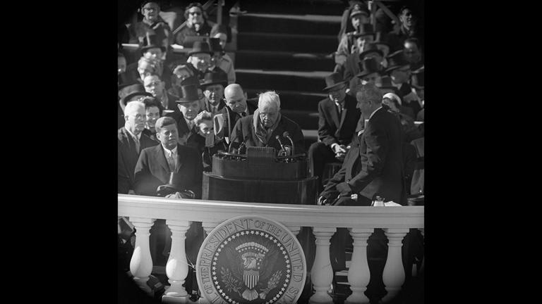 Poet Robert Frost (center) reads one of his poems during John F. Kennedy's inauguration ceremony at the Capitol in Washington, D.C., on Jan. 20, 1961. Getty Images