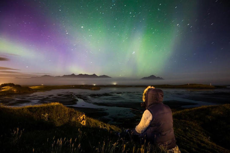 Watching the Northern Lights in Iceland.