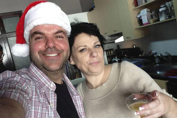 In this image provided by Johnathan Walton, Walton and Marianne Mair Smyth pose for a selfie in December 2013, at her tree trimm