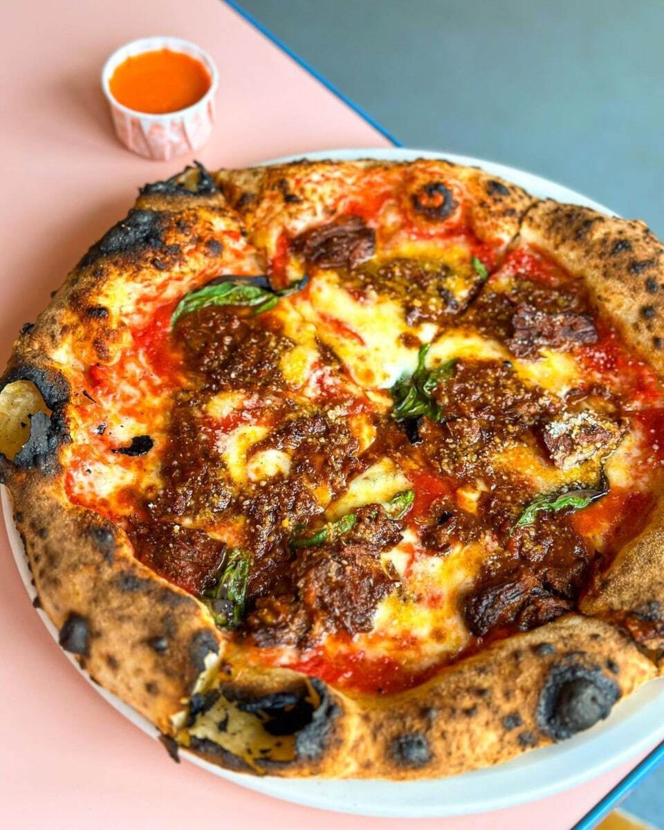 <p>You’re bound to fall head over heels in love with <a href="https://www.wearepoli.co.uk" title="https://www.wearepoli.co.uk">Poli</a>. Located in Kings Heath in Birmingham, the beloved pizzeria offers a selection of natural wines, small plates, and woodfired pizzas. Since its opening in 2019, it has garnered <a href="https://www.tripadvisor.co.uk/Restaurant_Review-g186402-d17598767-Reviews-Poli-Birmingham_West_Midlands_England.html" title="https://www.tripadvisor.co.uk/Restaurant_Review-g186402-d17598767-Reviews-Poli-Birmingham_West_Midlands_England.html">highly-rated reviews</a> and a cult following. You can expect the <a href="https://restaurantguru.com/POLI-Birmingham" title="https://restaurantguru.com/POLI-Birmingham">best slice in Brum</a> at a reasonable price. </p>