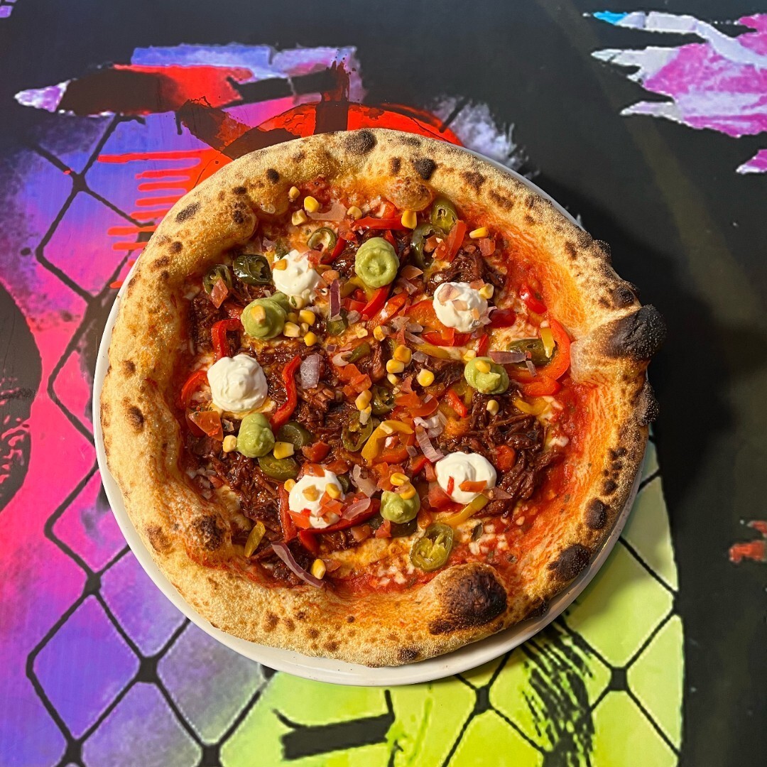 <p>If you fancy breaking the rules when it comes to your next meal, <a href="https://pizzapunks.co.uk" title="https://pizzapunks.co.uk">Pizza Punks in Leeds</a> is the place to be. The self-professed “advocates of freedom and expression” encourage you to create your own sourdough pizza with unlimited toppings. If that’s not enough to convince you it’s worth a visit, Pizza Punks was rated as the <a href="https://www.tripadvisor.co.uk/Restaurants-g186411-c31-zfn20484420-Leeds_West_Yorkshire_England.html" title="https://www.tripadvisor.co.uk/Restaurants-g186411-c31-zfn20484420-Leeds_West_Yorkshire_England.html">best pizza place</a> in the city on TripAdvisor and has tons of <a href="https://restaurantguru.com/Pizza-Punks-Leeds" title="https://restaurantguru.com/Pizza-Punks-Leeds">positive reviews</a>.</p>