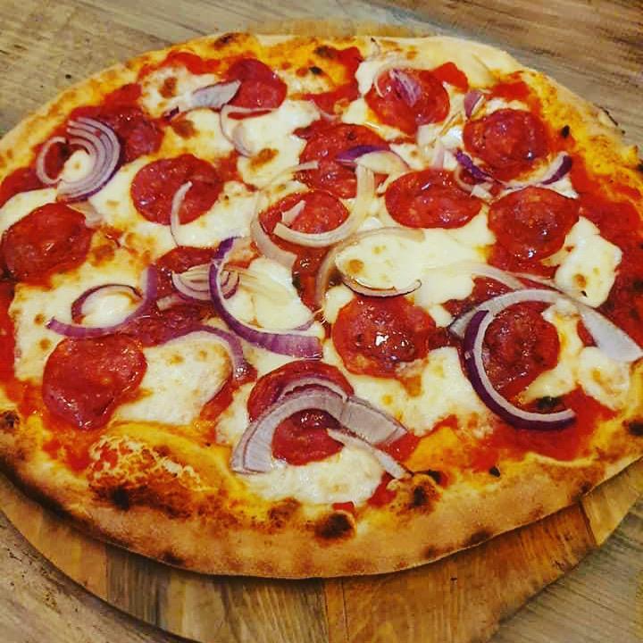<p>Next up, it’s a Bradford pizza place that <a href="https://www.tripadvisor.com/Restaurant_Review-g186408-d23555085-Reviews-La_Caverna_Pizzeria-Bradford_West_Yorkshire_England.html" title="https://www.tripadvisor.com/Restaurant_Review-g186408-d23555085-Reviews-La_Caverna_Pizzeria-Bradford_West_Yorkshire_England.html">comes highly rated</a> and with rave reviews across the board. <a href="https://lacavernapizzeria.co.uk" title="https://lacavernapizzeria.co.uk">La Caverna</a> is a traditional Italian pizzeria steeped in heritage that claims to transport you to the “very streets of Casinalbo, Modena circa 1979.” The owner comes from a family of pizza chefs, meaning you get an authentic taste of the Mediterranean.</p>