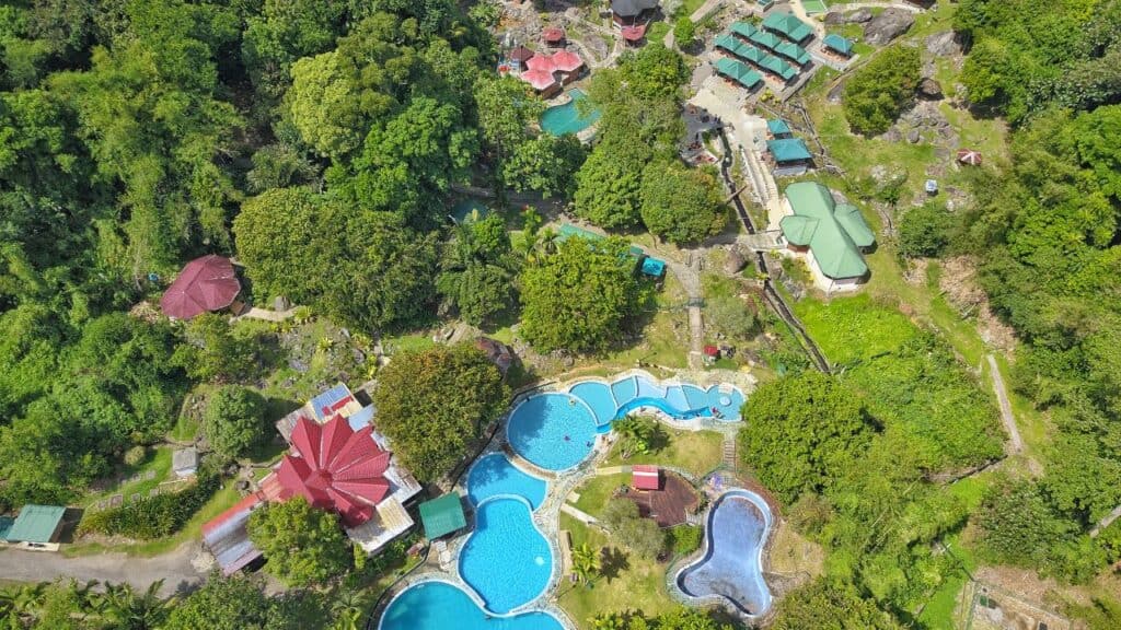 <p><span>Poring Hot Springs is around 136 kilometers from Kota Kinabalu. You will find natural hot springs and enjoy bathing in the pools (great if you’ve just climbed Mount Kinabalu), surrounded by lush tropical rainforests. </span></p><p><span>There’s a canopy walkway here (one of the longest in Southeast Asia), a butterfly farm, gardens, and plenty of walking trails. Poring Hot Springs also has changing rooms and a restaurant, making it an excellent place to spend the day comfortably.  </span></p>