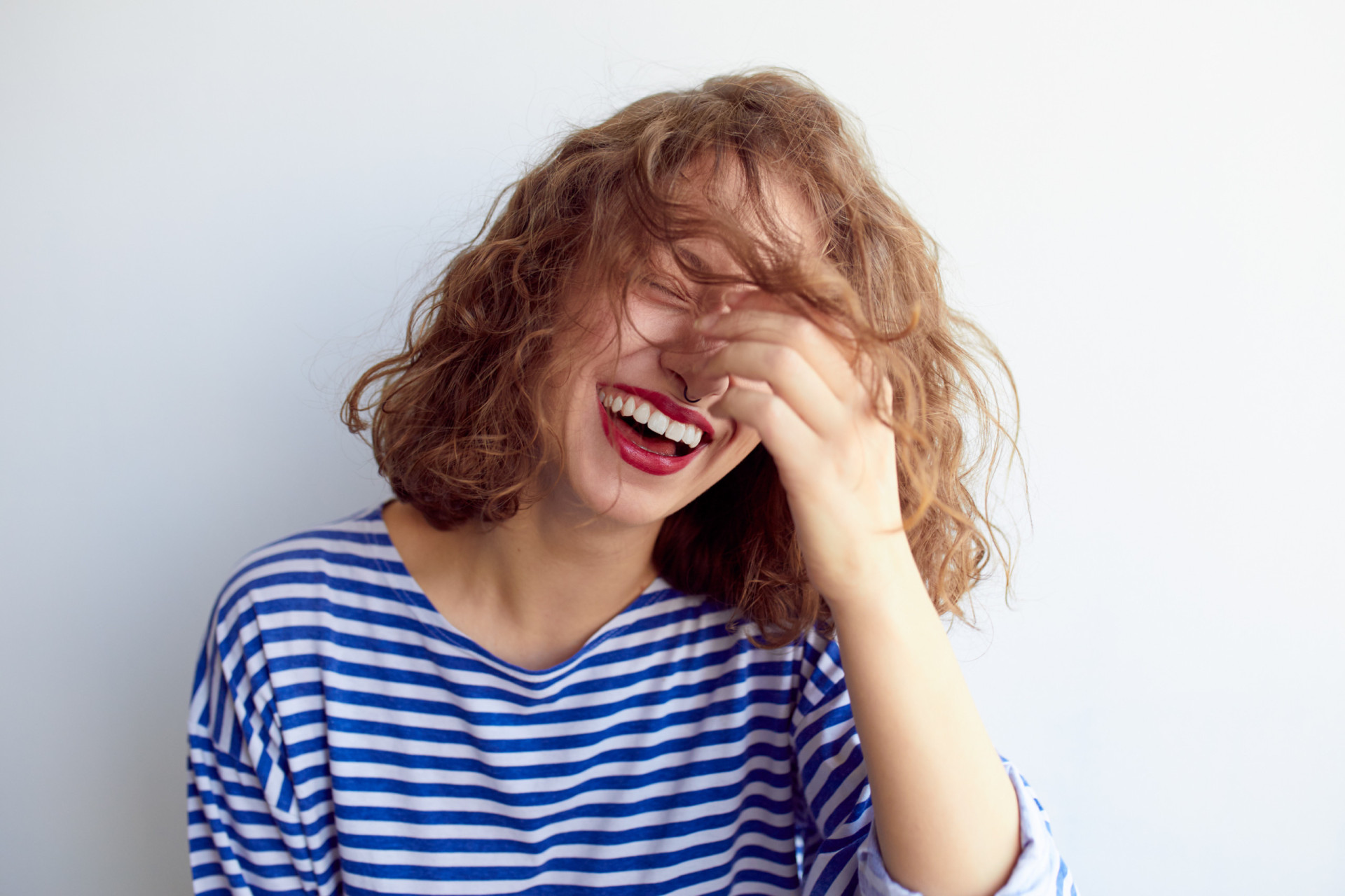 <p>This abbreviation stands for "laugh out loud" and typically means something is very funny. If you haven't been living under a rock, this one should be rather obvious!</p>