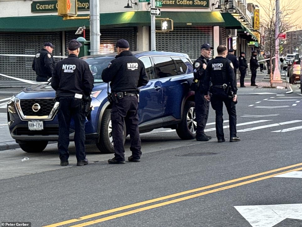 NYPD cop, 31, is shot dead by career criminal with 21 prior arrests