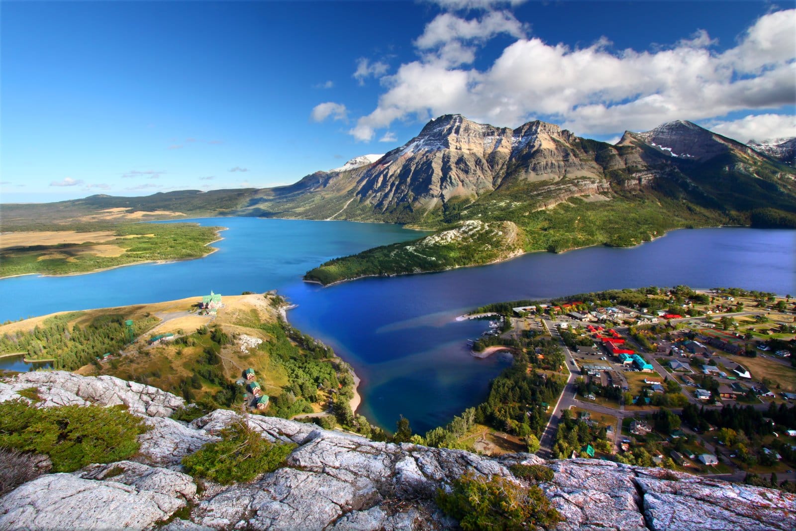 <p class="wp-caption-text">Image Credit: Shutterstock / Jason Patrick Ross</p>  <p><span>Waterton Lakes National Park, where the prairies meet the mountains, offers a unique blend of landscapes, including rugged mountains, rolling grasslands, and serene lakes. The park is part of the Waterton-Glacier International Peace Park, a UNESCO World Heritage site it shares with Glacier National Park in Montana, USA. Highlights include the historic Prince of Wales Hotel, offering panoramic views of Waterton Lake, and the Red Rock Canyon, known for its striking red argillite rock formations.</span></p>