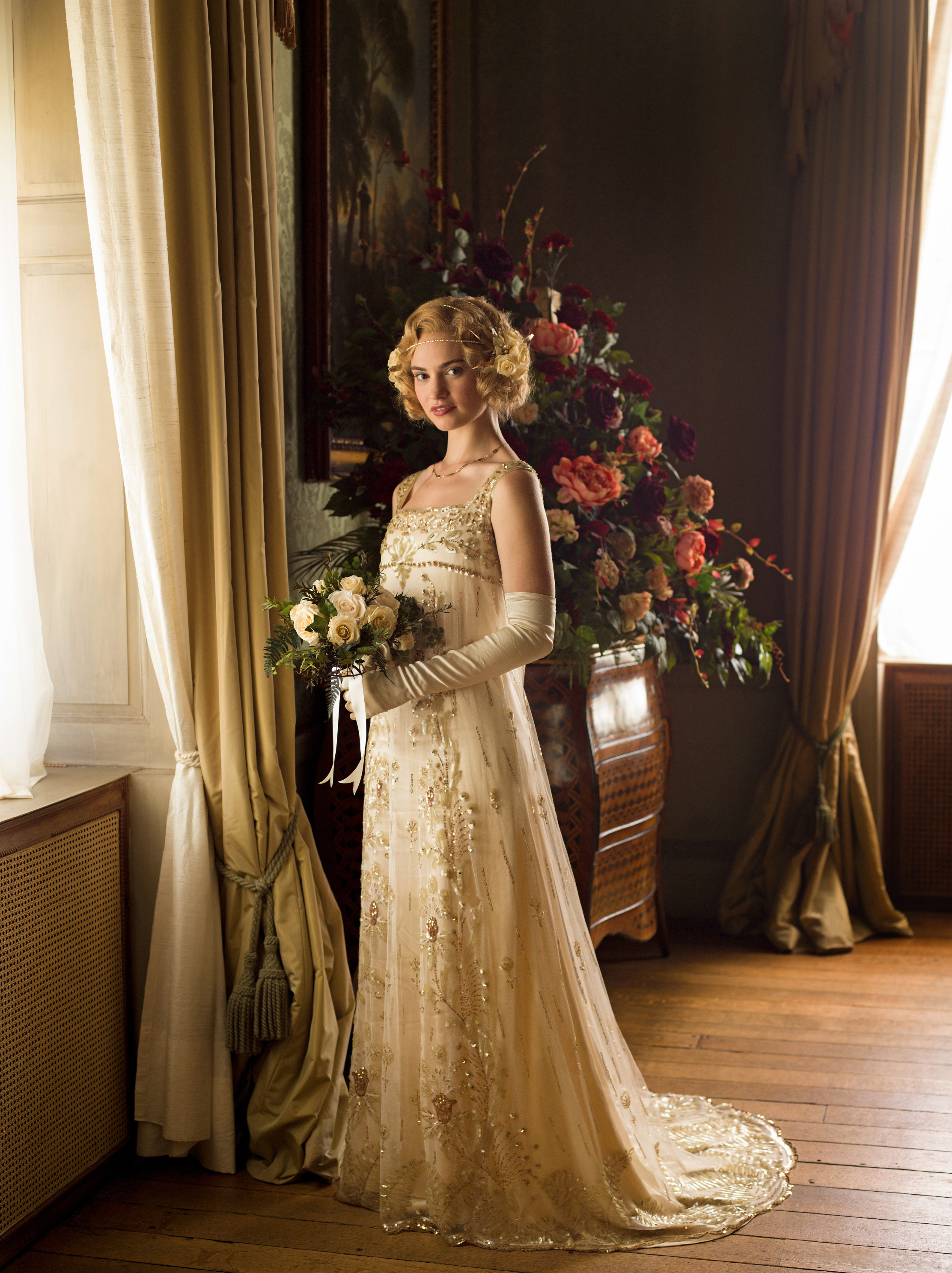 <p><span>Crawley cousin Lady Rose MacClare (played by Lily James) looked incredible in this beaded silk tulle gown that she wore to marry Atticus Aldridge on season 5 of "Downton Abbey." </span></p><p>"It was just a ghost of a dress, and I stumbled upon it," costumer designer Anna Mary Scott Robbins told PBS of the nearly century-old gown -- a 1920s original. "A trader I'd made friends with has a little shop in London and he actually kept it in a box. It had never been worn, and we managed to give it this fairy-tale ending, this wedding dress that was a hundred years old and had never been worn."</p><p>MORE: <a href="https://www.wonderwall.com/style/fashion/royal-wedding-dresses-princess-diana-kate-middleton-more-3007376.gallery">Royal wedding dresses </a></p>