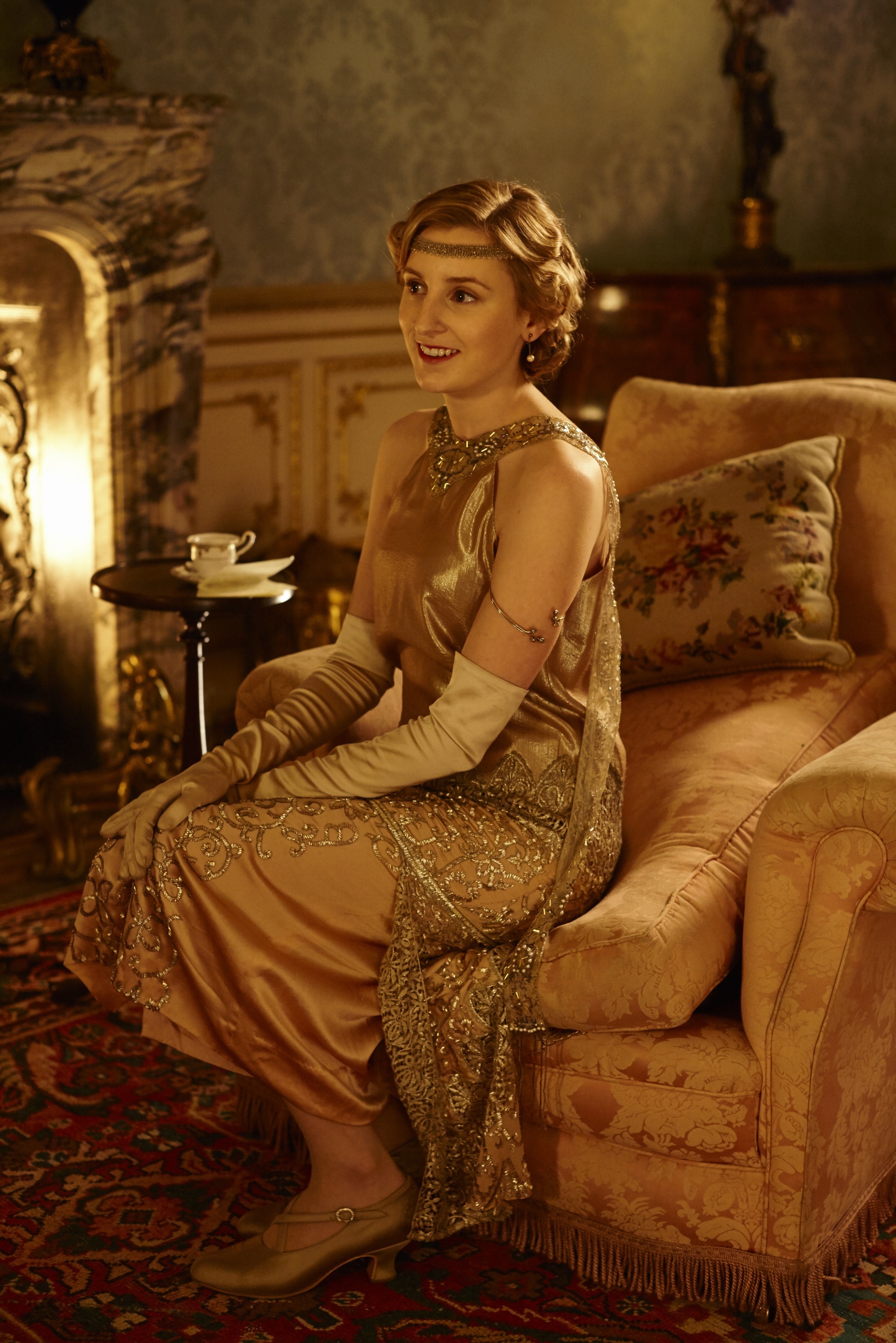 <p><span>When the "Downton Abbey" TV series wrapped with season 6, which was set in 1925, Laura Carmichael -- seen here as Lady Edith in a glamorous and intricately beaded peachy-gold dress with an attached cape that year -- said she would miss her costumes. "The clothes have been wonderful and having things made and designed with you in mind and for the storylines and for these occasions [has been] really, really special," she told Front Row Features.</span></p>