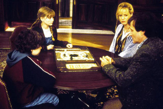 Moviestore/Shutterstock Bradley Pierce, Kirsten Dunst, Bonnie Hunt and Robin Williams in "Jumanji" (1995)