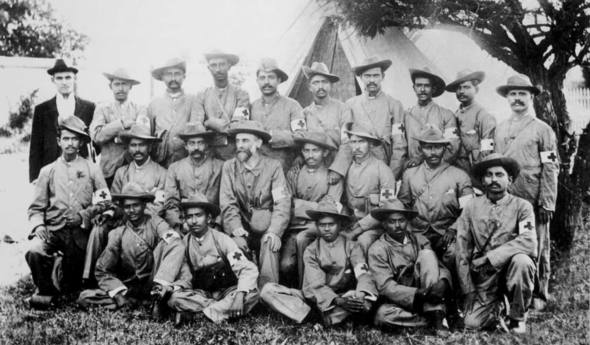 <p>During the Boer War (1899–1902), Gandhi volunteered to form a group of stretcher-bearers as the Natal Indian Ambulance Corps. He eventually raised 1,100 Indian volunteers to support British combat troops against the Boers. He's pictured here with colleagues (middle row, fifth from left) in 1900. </p><p>You may also like:<a href="https://www.starsinsider.com/n/278365?utm_source=msn.com&utm_medium=display&utm_campaign=referral_description&utm_content=447666v5en-us"> Endangered foods that may soon disappear from our planet</a></p>
