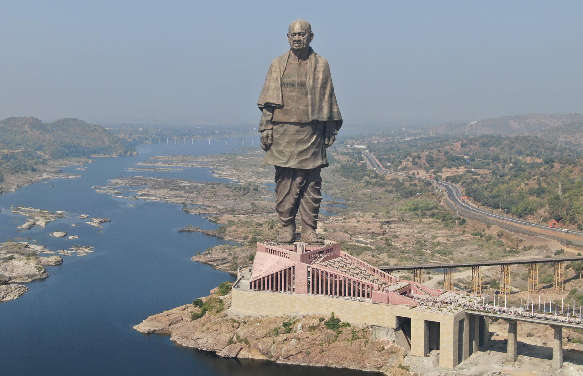 <p>Standing watch over the Narmada River in Gujarat, the colossal Statue of Unity looks more like something out of <em>The Lord of the Rings</em> than anything made by human hands. Completed in 2018, this copper-and-cement depiction of Indian statesman Sardar Vallabhbhai Patel is the tallest statue in the world, towering 597 feet above its surroundings. One of the nation's founding fathers, the so-called 'Iron Man of India' played a key role in integrating the country's diverse provinces and states.</p>  <p><a href="https://www.loveexploring.com/galleries/72892/the-worlds-tallest-hotels-with-breathtaking-views?page=1"><strong>Now check out the highest hotel rooms in the world</strong></a></p>  <p><span><strong>Liked this? Click on the Follow button above for more great stories from loveEXPLORING</strong></span></p>
