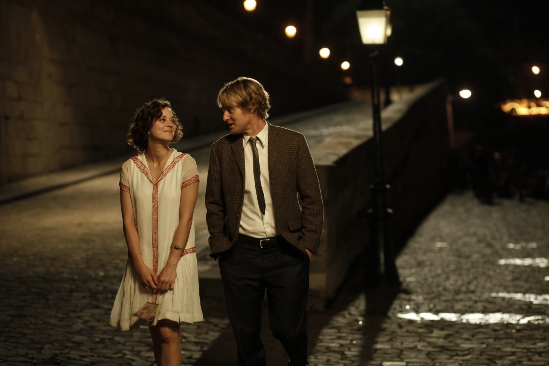 <p>Midnight in Paris - Can you go from being in Paris with your in-laws and fiancée in the 21st century to partying with Ernest Hemingway in the 1920s? You can if Woody Allen says so.</p> <p>Photo: Sony Pictures Classics</p>