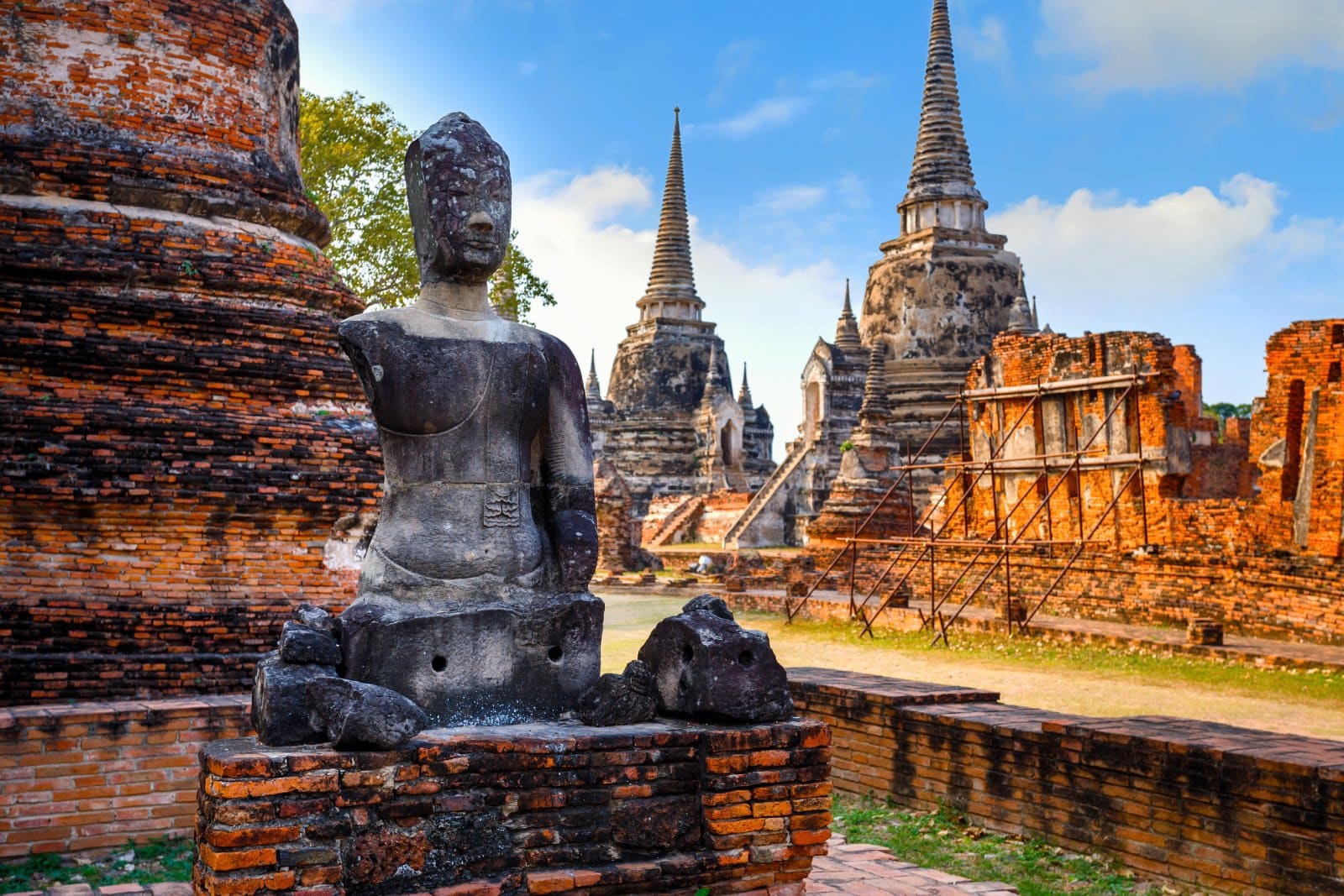 <p class="wp-caption-text">Image Credit: Shutterstock / cowardlion</p>  <p>Wat Ratchaburana and Wat Phra Si Sanphet stand as Ayutthaya’s architectural and historical highlights, each offering insights into the city’s rich past. Wat Ratchaburana, known for its well-preserved structure and Buddhist art from the 15th century, features a central prang and crypts with ancient frescoes and relics. Next door, Wat Phra Si Sanphet, notable for its three large chedis housing royal ashes, played a crucial role in royal ceremonies. These temples together showcase Ayutthaya’s architectural brilliance and spiritual heritage, contrasting Wat Ratchaburana’s detailed artistry with Wat Phra Si Sanphet’s ceremonial grandeur, reflecting the city’s complex history and its significance as a historical site.</p>