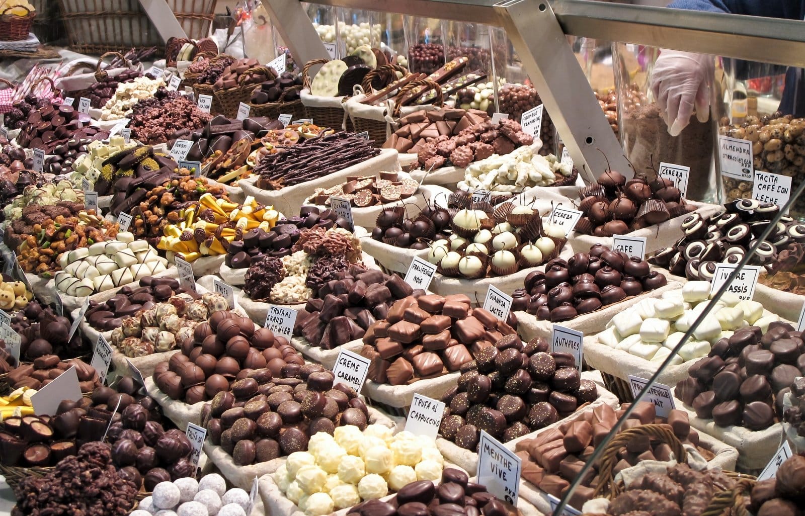 <p class="wp-caption-text">Image Credit: Shutterstock / Andreas Altenburger</p>  <p><span>The neighborhoods of Sant Pere, Santa Caterina i la Ribera, part of the larger Born area, are home to some of Barcelona’s most delightful artisanal chocolate shops. These boutiques offer a range of handmade chocolates and sweets, showcasing the craftsmanship and creativity of local chocolatiers. Visitors can find everything from traditional Spanish chocolates to contemporary creations infused with unique flavors. These shops often offer tastings and workshops, providing a deeper understanding of chocolate-making.</span></p>