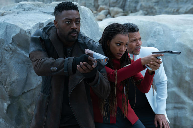 From left, David Ajala as Book, Sonequa Martin-Green as Burnham and Wilson Cruz as Culber in a scene from season five of "Star Trek: Discovery," streaming on Paramount+.