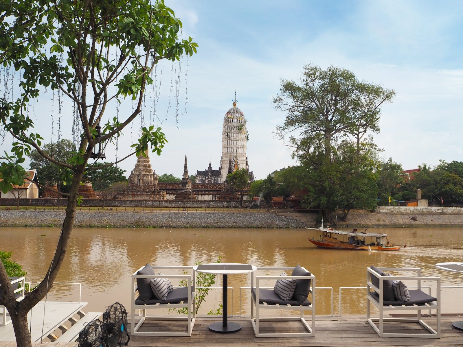 <p class="wp-caption-text">Image Credit: Shutterstock / Mongkolp</p>  <p><span>Lunch at Sala Ayutthaya Eatery and Bar provides a modern dining experience set against the historical backdrop of Wat Phutthaisawan. The restaurant specializes in Thai fusion cuisine, offering a contemporary take on traditional Thai flavors. The setting combines minimalist decor with views of the ancient temple, creating a contrast between the new and the old. The menu emphasizes using fresh, local ingredients, with river prawn dishes standing out as a highlight due to their freshness and quality.</span></p>