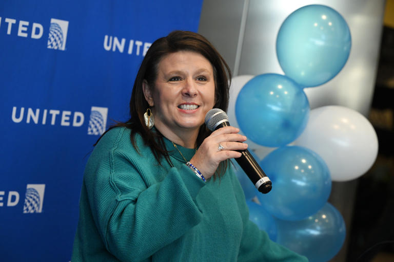 Jonna McGrath, Vice President of United’s Denver hub, speaks to employees during a Women’s History month event on the United concourse at Denver International Airport on March 26, 2024. McGrath is the first woman to head United's operations in Denver, the airline's fastest-growing hub.