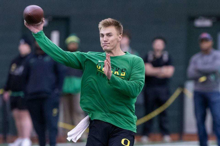 Oregon quarterback Bo Nix throws downfield as the Ducks hold their annual pro day in front of NFL scouts at the Moshofsky Center in Eugene, Oregon on Tuesday, March 12, 2024.