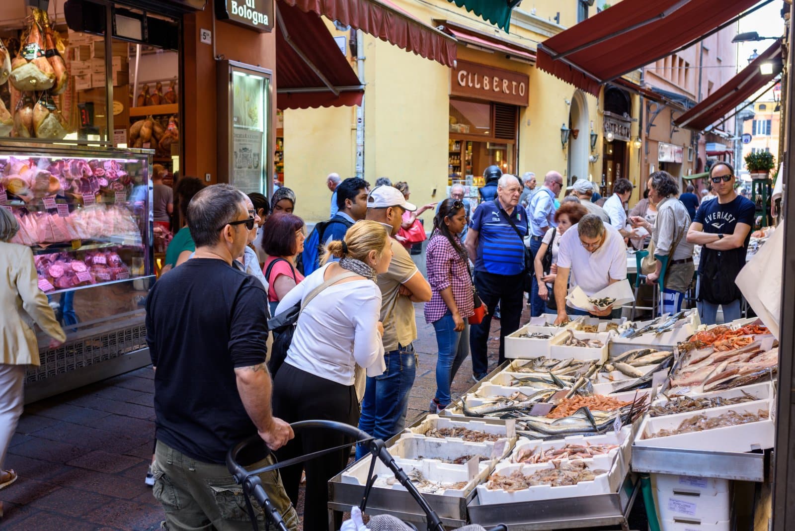 <p class="wp-caption-text">Image Credit: Shutterstock / Stramp</p>  <p><span>While you are out and about, you’ll notice that Bologna’s shopping scene is as diverse as its culinary offerings. Via Pescherie Vecchie is the heart of Bologna’s shopping, especially for food enthusiasts. This historic street has traditional shops selling fresh produce, pasta, meats, and cheeses. It’s a vibrant display of Bologna’s gastronomic richness, offering an opportunity to taste and purchase local specialties like mortadella, Parmigiano Reggiano, and the most divine balsamic vinegar. </span></p>